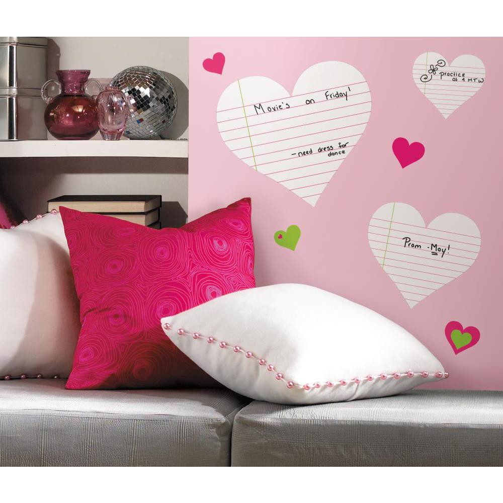 Keep important notes, dates, or even doodles right on your wall with these heart-shaped dry erase wall decals.
