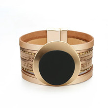 MAGNETIC BRACELET - GOLD & BLACK RAISED METAL