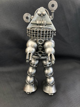 Handcrafted Found Art

Robbie the Robot Forbidden Planet

Size: 9"H x 4.5"D x 4.5"W
Weight: 4.0 lbs