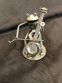 Handcrafted Found Art

Frog Cellist Cello

4 x 3 x 2