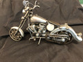 Handcrafted Found Art

Motorcycle 4C

12 x 5 x 5

Moving Parts:  Wheels, Handlebars, chain to make back wheel go around