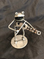 Handcrafted Found Art 

Frog playing violin fiddle

2" X 6" X 3"   