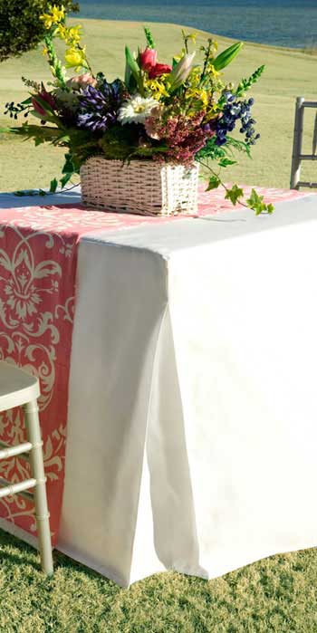 White fitted table cover outdoors