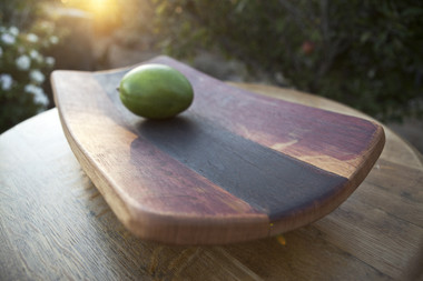 The all-oak platter has curved, concave design with a smooth finish. It is larger than the small Marsala Platter, holds even more of your favorite food items.