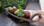 What a unique piece, an all-oak platter with handles has curved, concave design and smooth finish. A great way to serve or display fruit or bread.