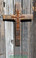 Cross, with decoration, by creatively combining particular symbols and images with wine barrel staves, each cross is a distinctive statement of faith.