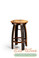 The  Stool has a unique, sturdy design including arched legs, a flat round seating surface of inlaid American  Oak, and a footrest made with rusty steel barrel rings.

