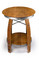 Rustic wine barrel side table made from reclaimed oak wine barrels with round barrel head top and lower shelf