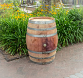 "Authentic reclaimed oak wine barrel with metal hoops, stamped with Napa Valley logo. Perfect for home décor, garden planters, rustic bars, and DIY furniture projects."