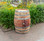 "Authentic reclaimed oak wine barrel with metal hoops, stamped with Napa Valley logo. Perfect for home décor, garden planters, rustic bars, and DIY furniture projects."