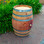 "Authentic reclaimed oak wine barrel with metal hoops, stamped with Napa Valley logo. Perfect for home décor, garden planters, rustic bars, and DIY furniture projects."
