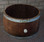 Rustic center wine barrel planter 26x17 inches with stain and black screws – recycled oak garden pot.