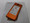 Docomo Sharp SH-07E Aquos Phone Si Orange Rear