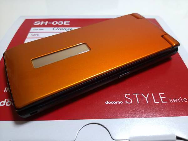 新品 docomo STYLE series SH-03E　オレンジ DOCOMO SHARP SH-03E STYLISH BLACK WATERPROOF FLIP PHONE