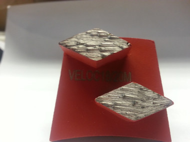 Veloci-Raptor Diamond Cake is uniquely designed as a bi-directional blade so there is no need to worry about directions for FAST removal of mastic glues and paint. This cake was designed for the concrete polishing contractor. 18/20# Grit diamond in these high 10mm arrow segments allow the contractor to remove glue and still be able to polish concrete.