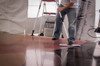 Prosoco GuardEXT being applied with a microfiber pad to protect the floor