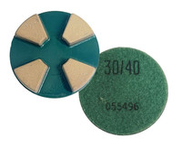 The Premium 4 Segment Transitional Diamond is used as the first step on new, hard to very hard concrete, cutting through the cream. Its unique design makes this diamond more aggressive, so it can penetrate deep into the cream, opening up the floor. The result is faster production and fewer steps. Plus, with Blue Star Diamond Technology™, a ceramic bond matrix that’s stronger than a traditional resin bond, this diamond keeps cutting when most metal bond diamonds fail, offering better lifespan and reliability so you can get the job done.

Note that this diamond should not be used on concrete floors with cure and seal, mastic, or to remove coatings.
