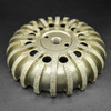 Cove base cup wheels are designed for grinding up on industrial seamless cove base.