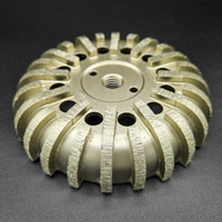 Cove base cup wheels are designed for grinding up on industrial seamless cove base.