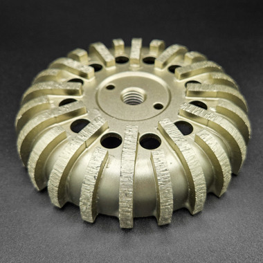 Cove base cup wheels are designed for grinding up on industrial seamless cove base.