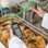 CaterTemp Food Probe Thermometer in black in front of hot food tray