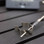 Focused close up of gripping arms of spare clip for Q Series