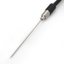Close-up of probe tip measuring temperature in sous-vide bag