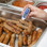 Waterproof Thermometer with pocket displaying hot food temperatures alongside buttons