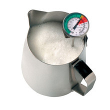 Barista milk frothing thermometer with large 45 mm dial and long 175 mm stem attached to milk jug