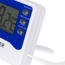Close up of control buttons for digital thermometer