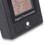 ETI Digital Max/Min Thermometer with LCD Bar Graph on a desk in a greenhouse setting