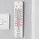 ETI Room Thermometer 803-232 displayed in a home office setting