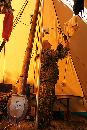 Hunter inside large tent