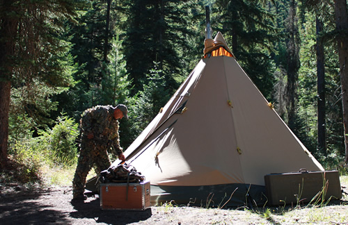 Hunter entering Tentipi tent after morning hunt