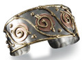 Anju Swirl Mixed Metal Brass,  Copper and Stainless Steel Swirl Cuff Bracelet