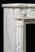 The Versailles marble mantel.