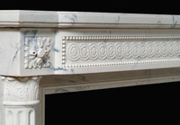 The Versailles marble mantel.