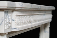 The Versailles marble mantel.