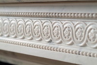 The Versailles marble mantel.