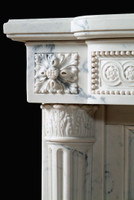 The Versailles marble mantel.