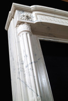 The Versailles marble mantel.
