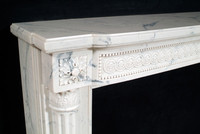 The Versailles marble mantel.