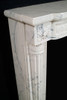 The Versailles marble mantel.