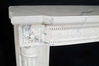 The Versailles marble mantel.