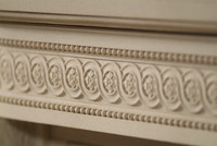 The Versailles marble mantel.