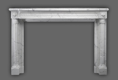 The Versailles Neoclassical style with beautifuly tapered legs on this marble mantel.