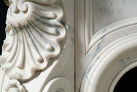 All the hairline details of the original marble mantel