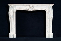 The Louis XIV style marble mantel in carrara marble