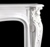 Acanthus leafs, shells and gentle curves mark this marble mantel in Italian Bianco