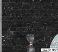 Carverne Noir is a dramatic split face stone resembling beautiful marble, with streaks or specs of white on most pieces.